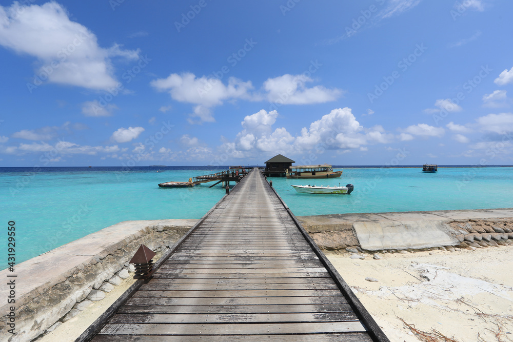 paradise idyllic seascape in the Indian Ocean, turquoise water and blue sky