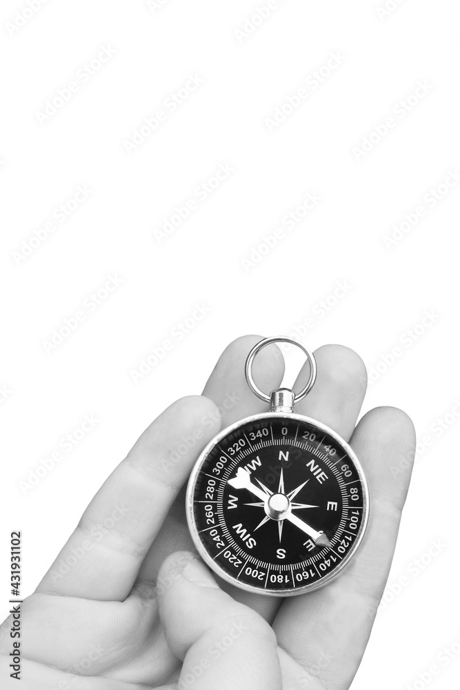 round compass in hand isolated on white background for abstract image with place for text as symbol of tourism with compass, travel with compass and outdoor activities with compass round compass in hand isolated on white background for abstract image with place for text as symbol of tourism with compass, travel with compass and outdoor activities with compass