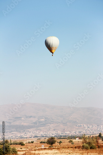 Balloon for aeronautics on the background of mountains