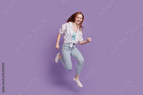 Portrait of dreamy careless lady jump run hurry shopping concept on violet background