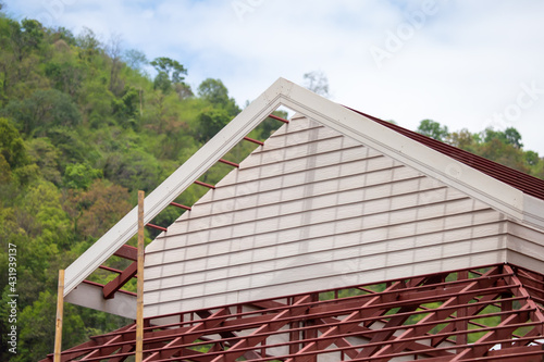 With white synthetic wood made from fiber cement  builders attached the roof instead of wood. Get a beautiful pattern like wood But durable  prevent eating termites  and reduce costs.