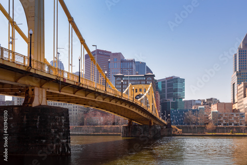 The Roberto Clemente Bridge that connects downtown Pittsburgh and the North Shore. This is in Pennsylvania USA and the bridge sits atop the Allegheny River. photo