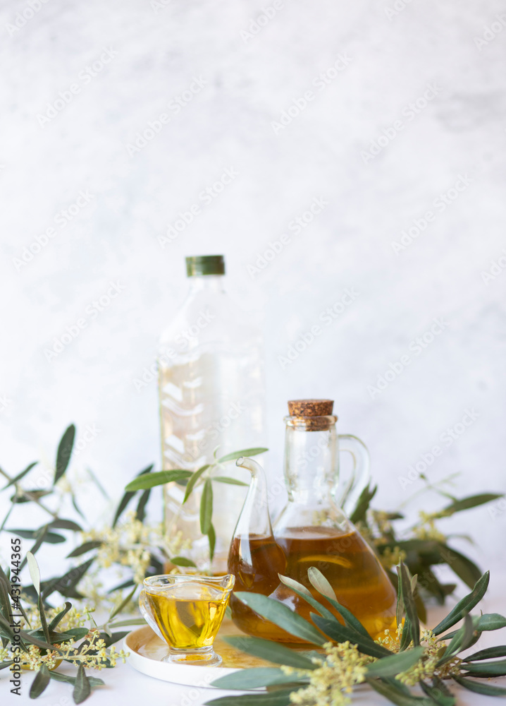 Olive branch and olive oil bottle isolated on white. Olive branch and olive oil bottle isolated on white.
