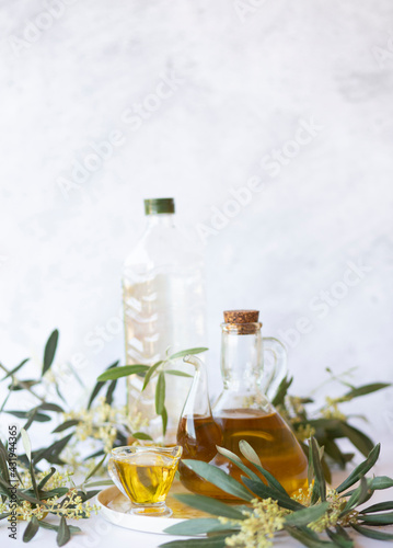 Wallpaper Mural Olive branch and olive oil bottle isolated on white. Torontodigital.ca