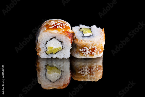 Unagi onigara roll, smoked eel, cream cheese, tanukan, unagi sauce, sesame