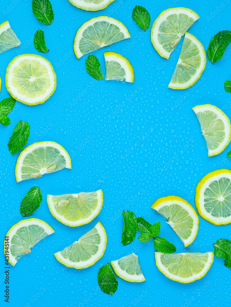 Lemon and mint leaves on blue background,Frame from lemon slices and mint leaves on blue pastel table top view. Ingredients for summer drink and lemonade. Flat lay style. Lemon and mint leaves on blue background,Frame from lemon slices and mint leaves on blue pastel table top view. Ingredients for summer drink and lemonade. Flat lay style.