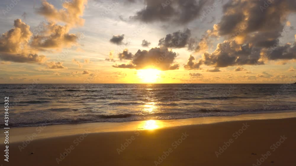 Professional Video. sunset tropical beach sea. Phuket Thailand beautiful tropical beach with a sunset sky. Beautiful Phuket beach is a famous tourist destination in Andaman sea Professional Video. sunset tropical beach sea. Phuket Thailand beautiful tropical beach with a sunset sky. Beautiful Phuket beach is a famous tourist destination in Andaman sea