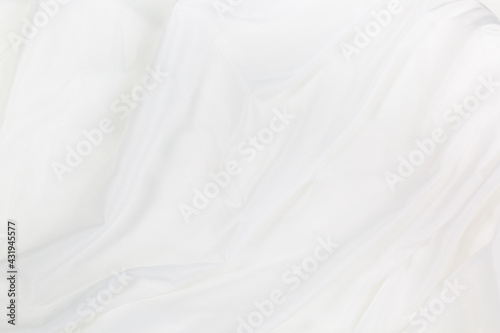 White cloth background abstract with soft waves,Closeup elegant crumpled of white silk fabric cloth background and texture. Luxury background design.