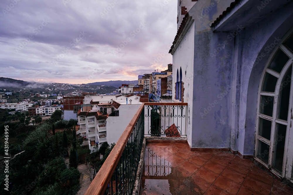 View from the old balcony on the streets in the blue city of Chefchaouen, Morocco.