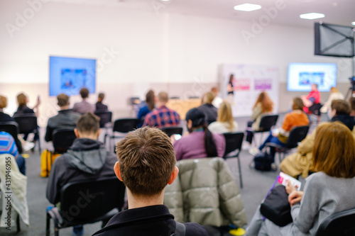 Business speaker doing presentation to audience