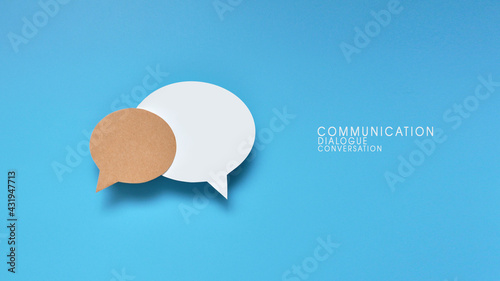 Two conversational words and an inscription: communication. The symbol of conversations and dialogues