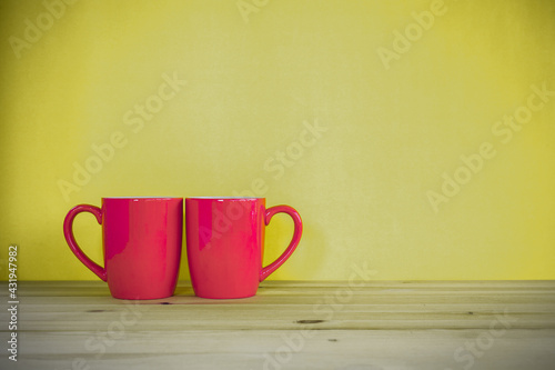 Red coffee cups on table 