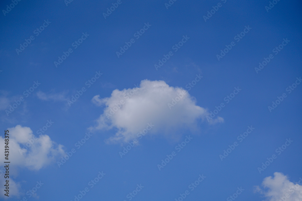 Clouds over Bavaria in May with strong wind and blue white sky Clouds over Bavaria in May with strong wind and blue white sky