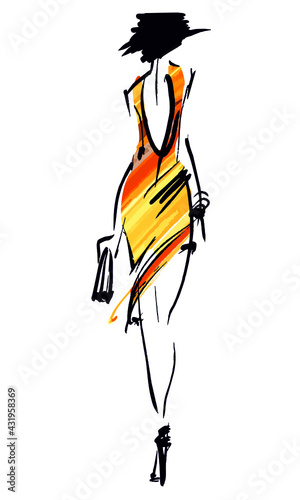 Fashion model with hairstyle in a hat. Fashion show. Designer evening dress