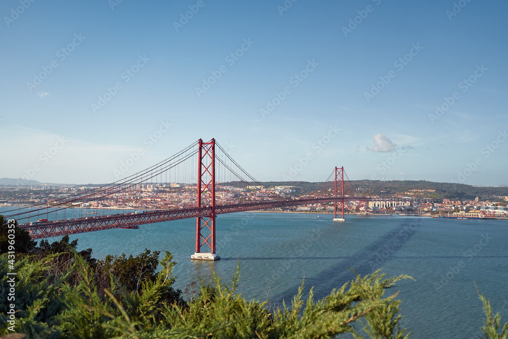 Beautiful landscape with suspension 25 April bridge bridge over the Tagus river in Lisbon, Portugal. Beautiful landscape with suspension 25 April bridge bridge over the Tagus river in Lisbon, Portugal.