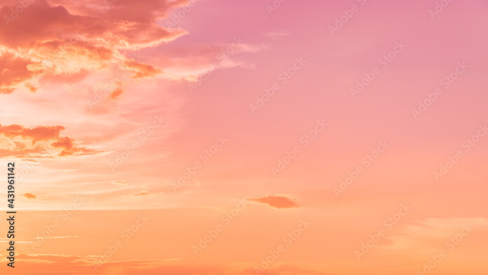 Obraz premium Pastel colorful pink, orange, yellow sky background 