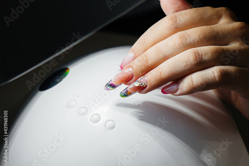 Beautiful women's manicure close-up in a beauty salon
