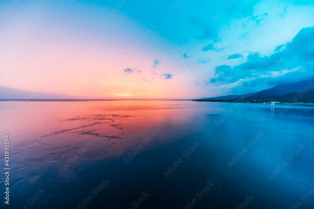 Papua New Guinea, Milne Bay Province, Alotau, Long exposure of sea at dusk Papua New Guinea, Milne Bay Province, Alotau, Long exposure of sea at dusk