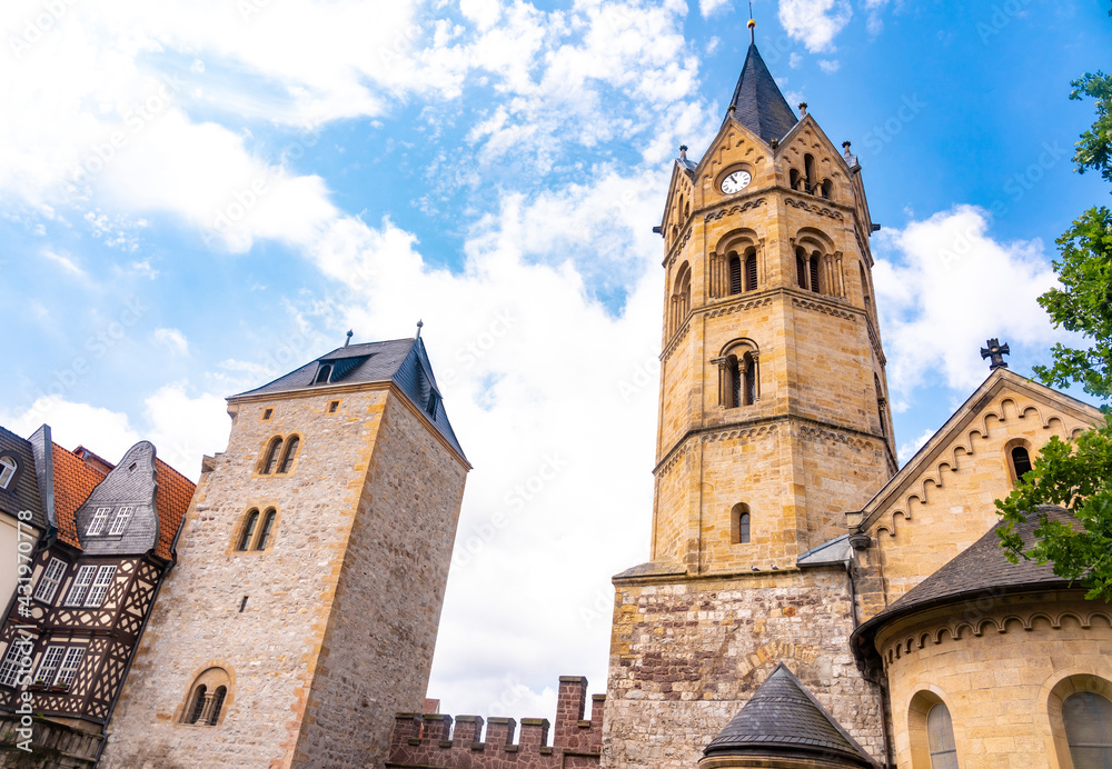 Clock tower of St Nicholas Church against cloudy sky at Eisenach, Germany Clock tower of St Nicholas Church against cloudy sky at Eisenach, Germany