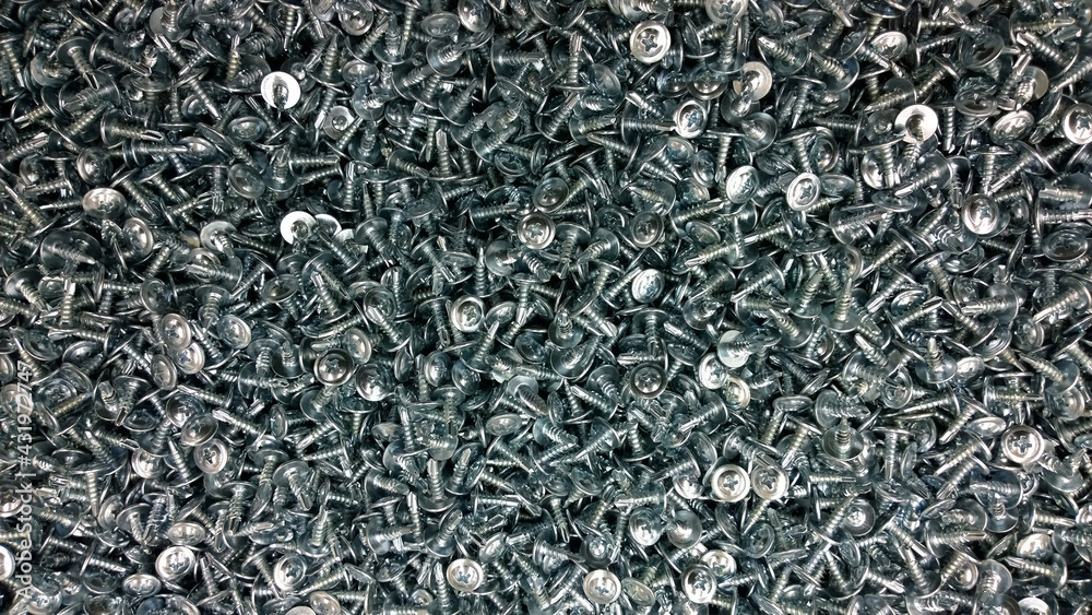 Background or texture of self-tapping screws for metal with a drill and a press washer Background or texture of self-tapping screws for metal with a drill and a press washer