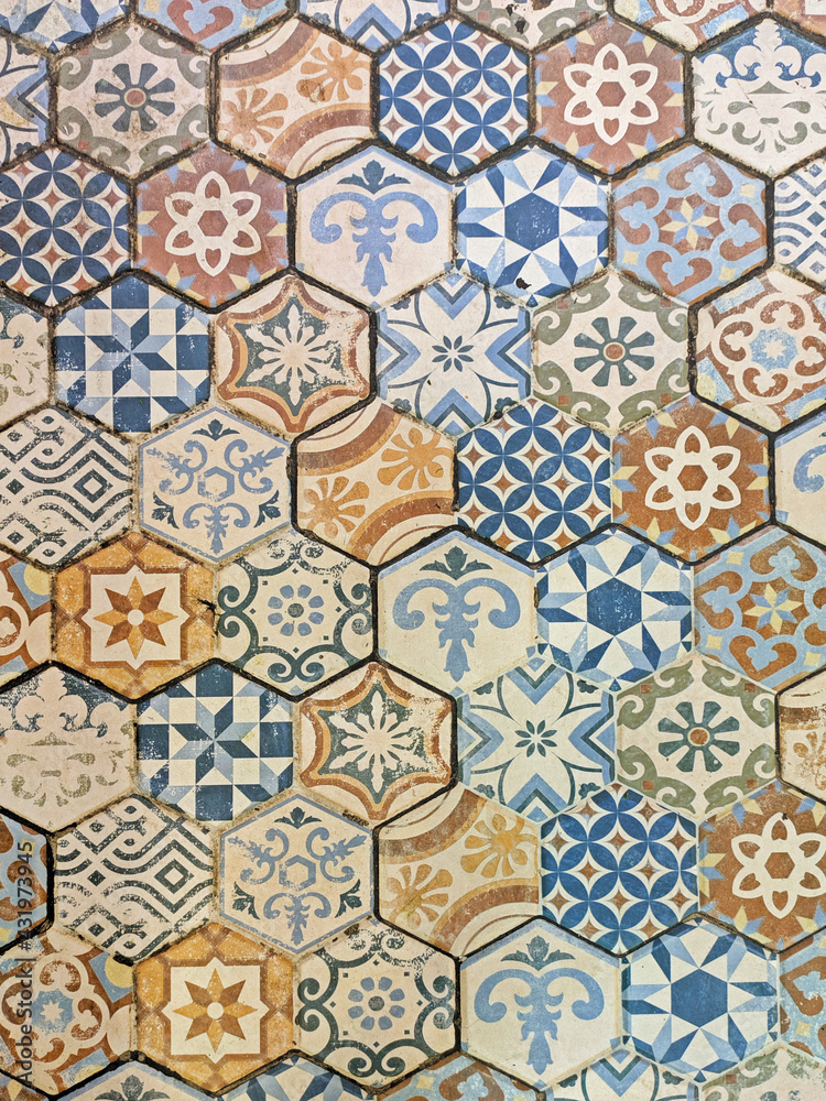 Colorful vintage ceramic hexagonal tiles as background or texture