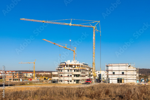 Germany, Baden Wurttemberg, Sindelfingen, Construction site with cranes