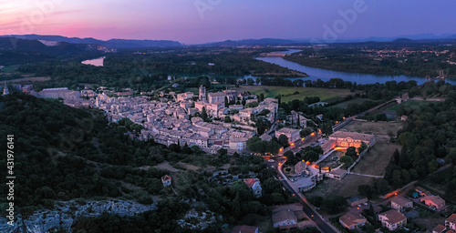 France, Ardeche, Aerial view of medieval town at dusk  photo