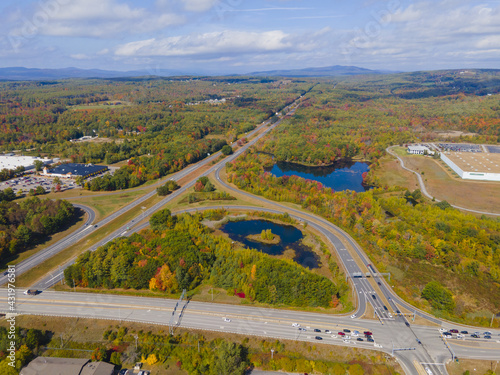 Interstate Highway 93 at Exit 20 with US Route 3 in White Mountain National Forest aerial view with fall foliage, Town of Tilton, New Hampshire NH, USA.
