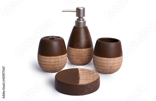 brown and gold ceramic bath set on isolated white background