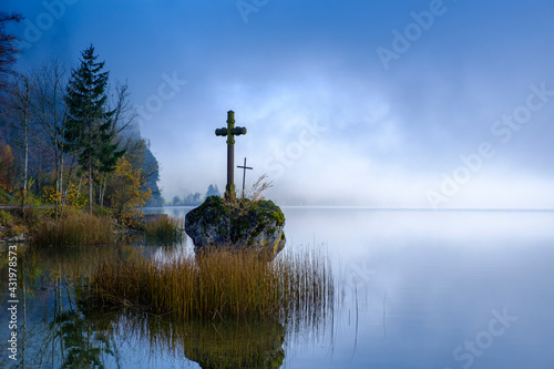 Austria, Upper Austria, Salzkammergut, Mondsee lake in fog at sunrise