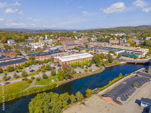 Laconia city center and Opechee Bay of Lake Winnipesaukee aerial view with fall foliage in downtown Laconia, New Hampshire NH, USA.  photo