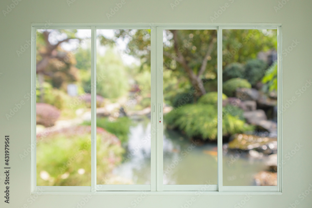 Fototapeta premium garden view outside through the window