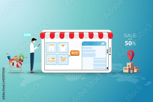 Concept of online shopping, young man wear a medical face mask and hold a tablet to chat with customer service to order the goods in green color background