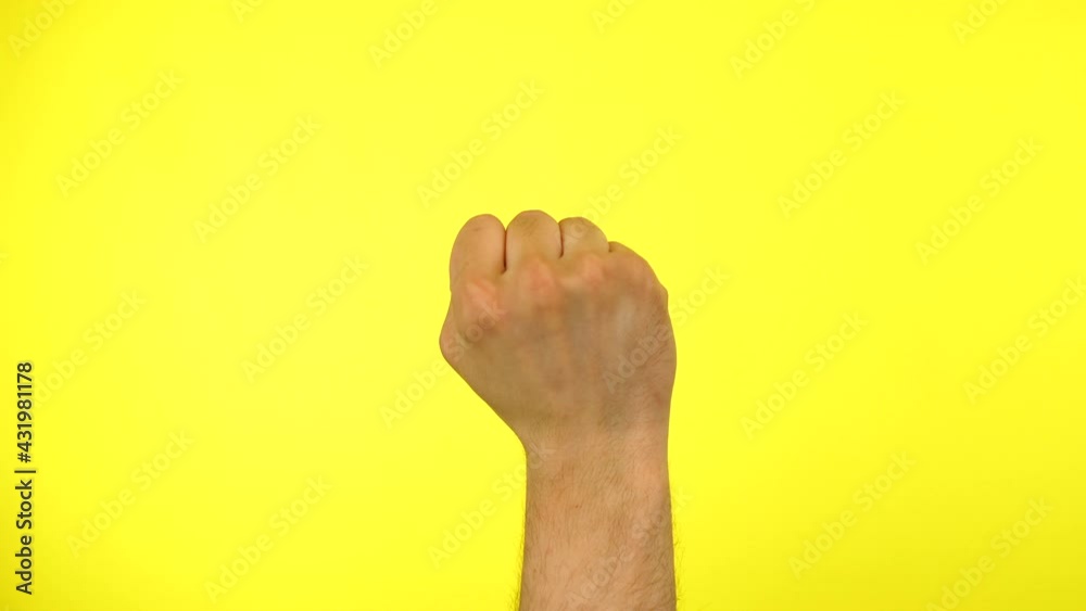 Cropped close up man male hand fists knocking door gesture knock-knock who there Cropped close up man male hand fists knocking door gesture knock-knock who there