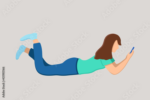 A young brunette girl is lying on her stomach with a phone in her hands. Communication by phone, freelance work. Vector illustration.