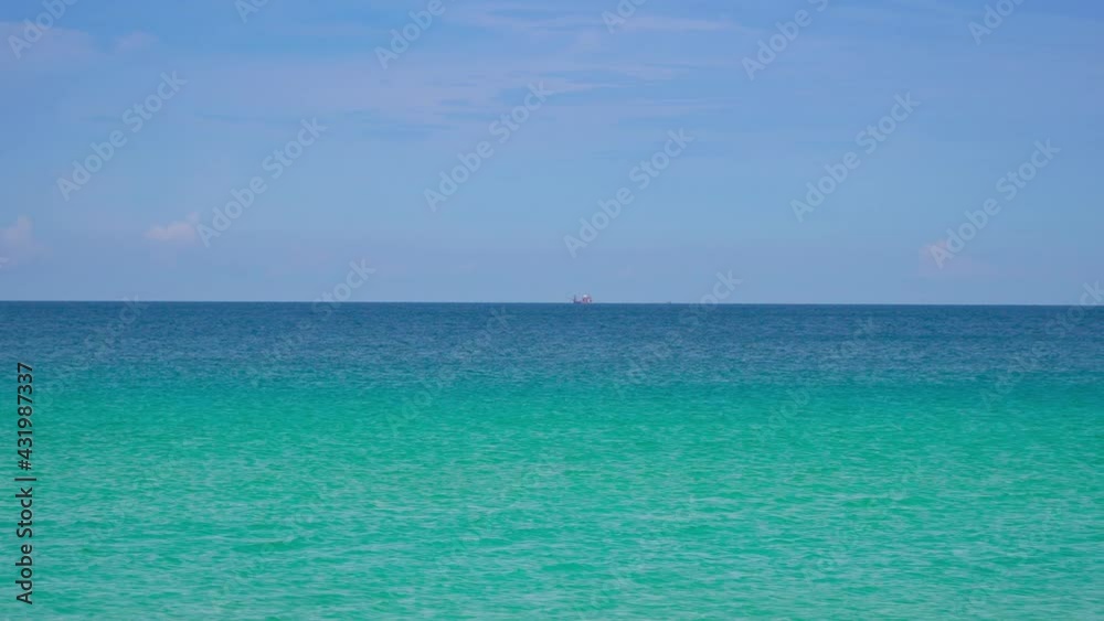 4K. Professional Video. Phuket Thailand Summer beach sea. No people at beach. Summer beach sea blue sky background. Nature and travel concept. 4K. Professional Video. Phuket Thailand Summer beach sea. No people at beach. Summer beach sea blue sky background. Nature and travel concept.