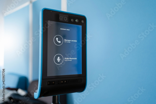 Close-up of assistant robot screen at office