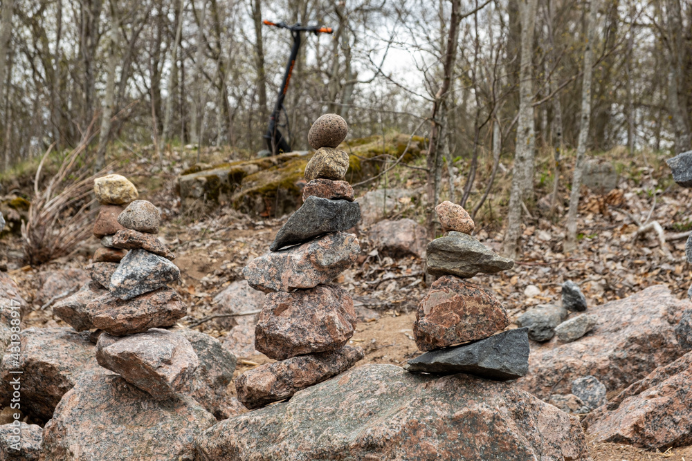 zen stack of rocks stones in dark forest a symbol of harmony and balance zen stack of rocks stones in dark forest a symbol of harmony and balance