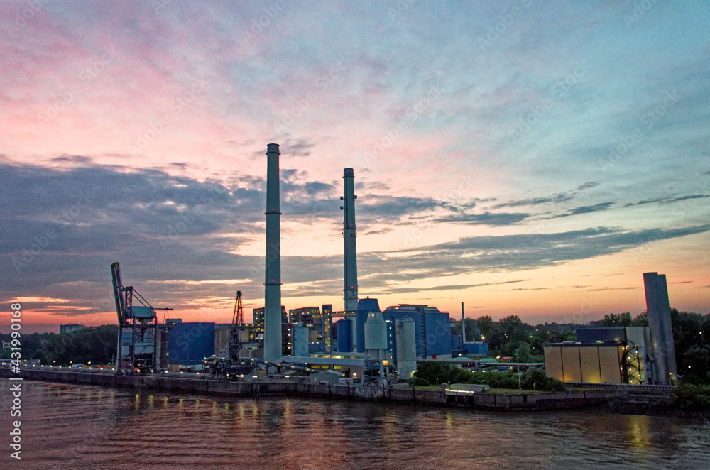 Industrial landscape at the sunset on the River Elbe - Hamburg
