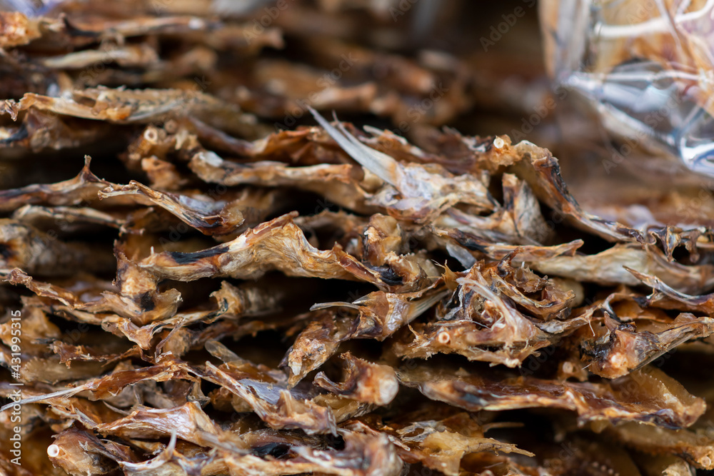 Dried Fish one of the dried seafood dishes, lined up on a tray and blurred the background. Dried Fish one of the dried seafood dishes, lined up on a tray and blurred the background.