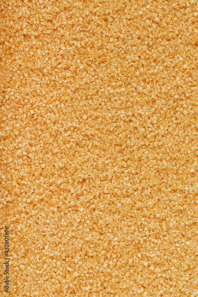 Texture of golden sand on the beach with a solid background in full screen Texture of golden sand on the beach with a solid background in full screen