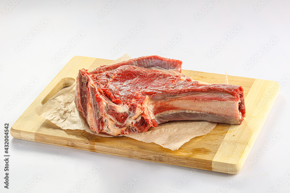 Raw bones for cooking over board Raw bones for cooking over board