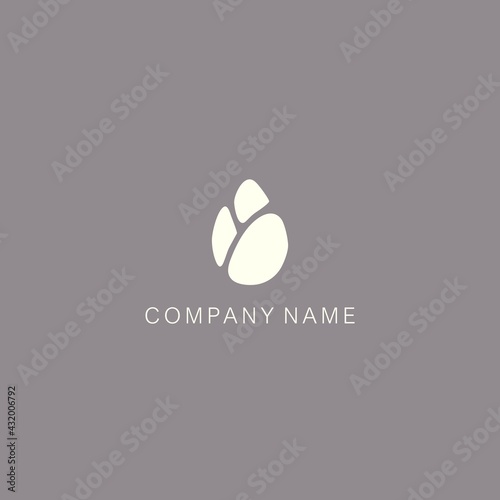 A symbol or logo of a simple, minimalistic, stylized flower bud shape, consisting of three element. Made with a spot.