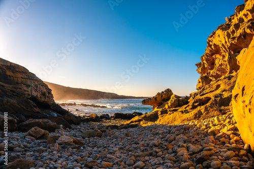 Fototapeta Naklejka Na Ścianę i Meble -  Stony cove in the Jaizkibel mountain in the town of Pasajes near San Sebastian. Basque Country