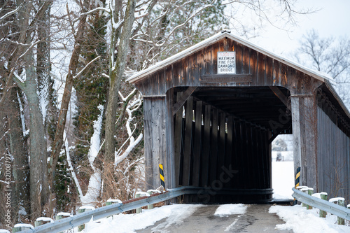 Historic McCafferty Road Covered Bridge - Howe Truss - Surrounded by Deep Snow in Winter - Lynchburg, Ohio photo