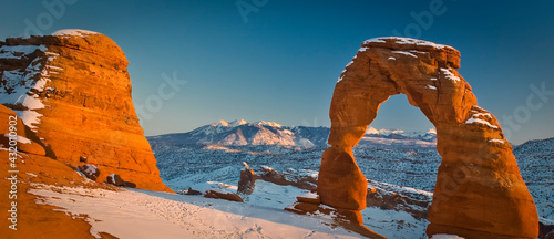 Winter sunset on Delicate arch in Arches National Park, Utah photo