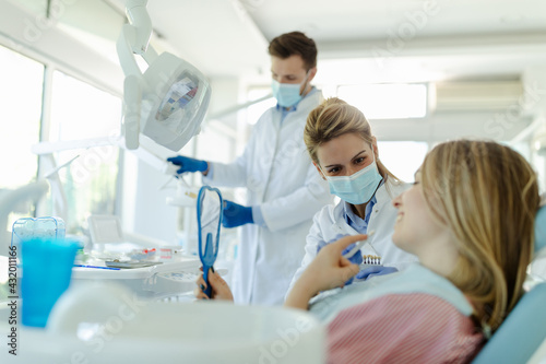 Adult woman having a visit at the dentist's.