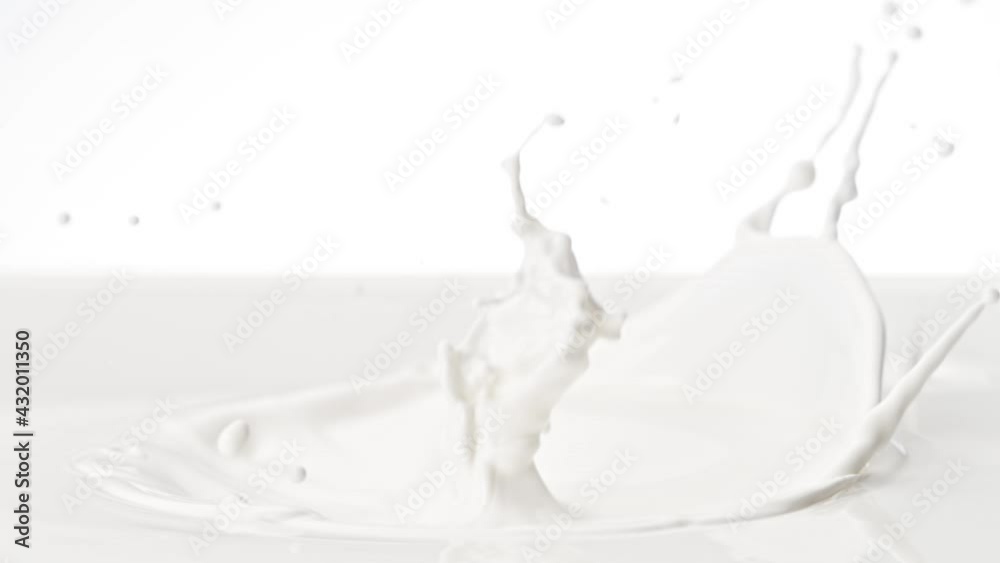 Super Slow Motion Detail Shot of Fresh Cream Crown at 1000 fps.