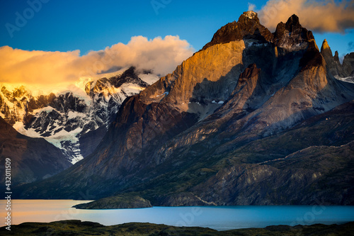 Sunrise looking to Paine Grande on the left and Los Cuernos on the right in Torres del Paine National Park is located in southern Chilean Patagonia. photo