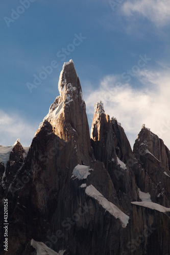 The strong and jagged peak of Cerro Torre, one of the most technical climbs in the world, just before sunset in Patagonia, Argentina.